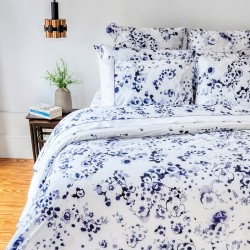 Bedding sheet with blue and violet print